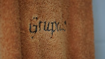 A close-up of a textured surface with the word "Gruppe" visible.