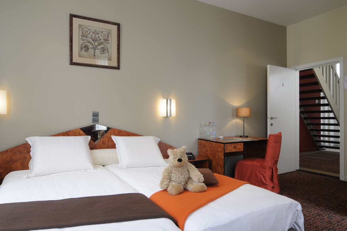 Select Comfort beds, desk, blackout curtains, soundproofing