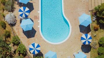 Outdoor pool, pool umbrellas, sun loungers