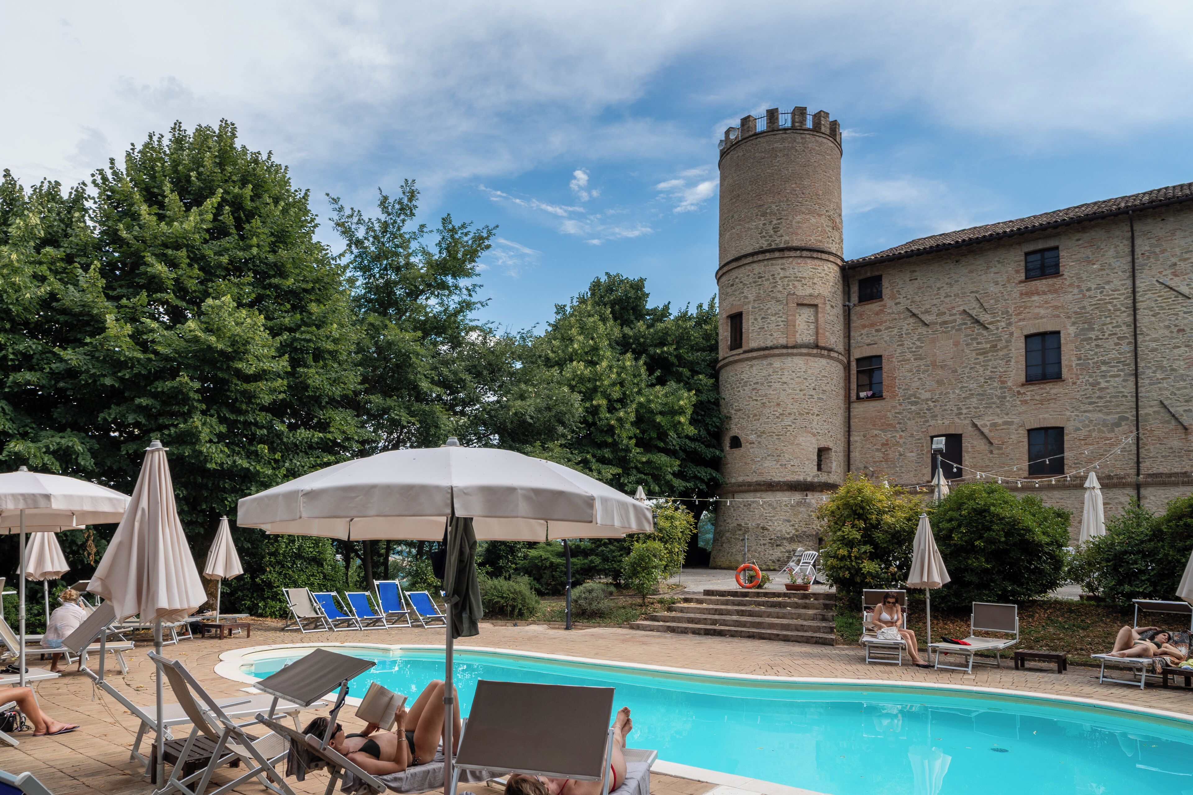 Outdoor pool, pool umbrellas, sun loungers