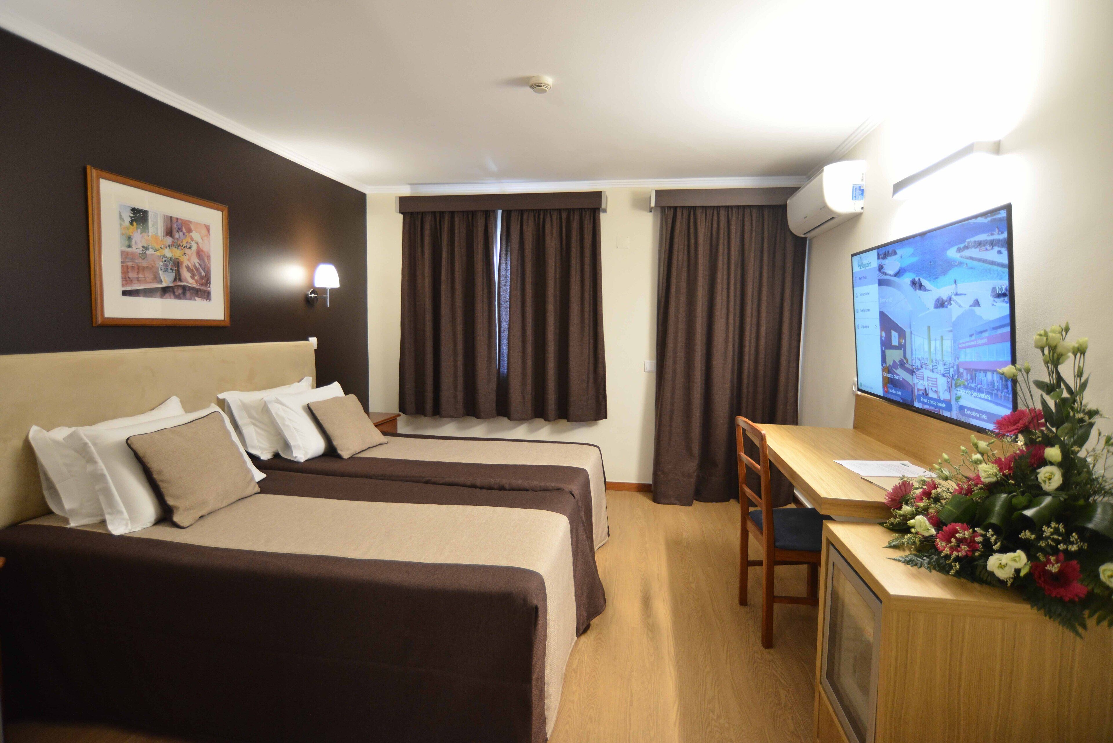 Minibar, desk, blackout drapes, soundproofing