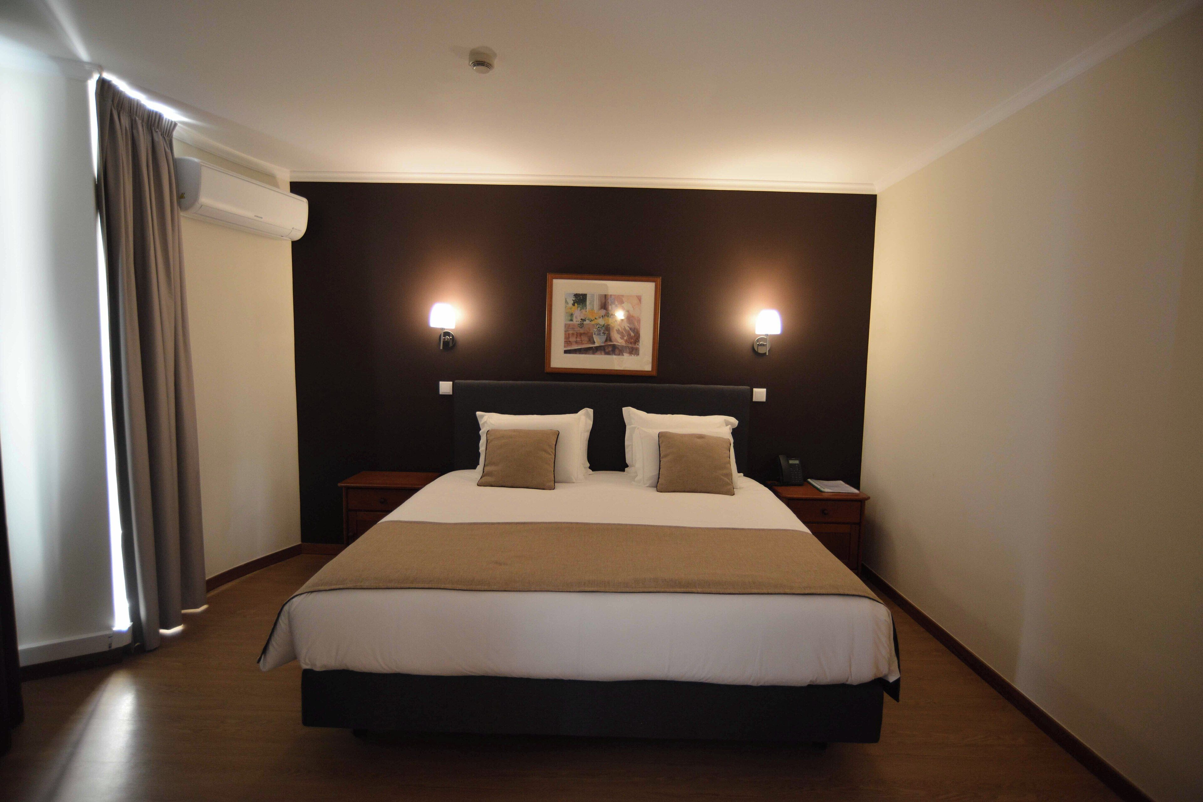 Minibar, desk, blackout drapes, soundproofing