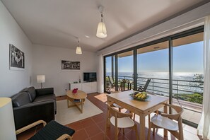 Apartment, 1 Bedroom, Ocean View | Living area | Plasma TV