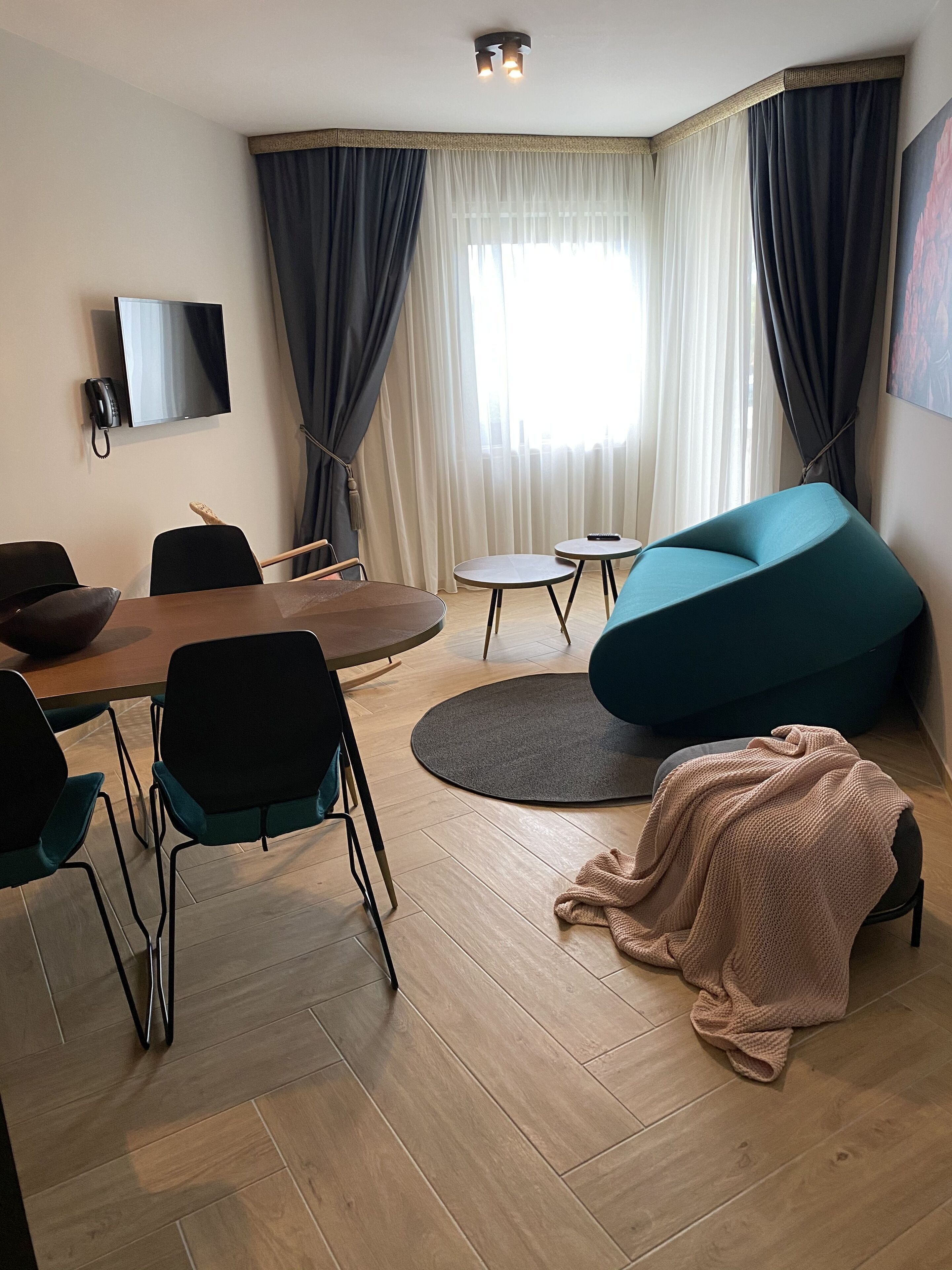 Appartement, vue mer | Coin séjour | Télévision LCD