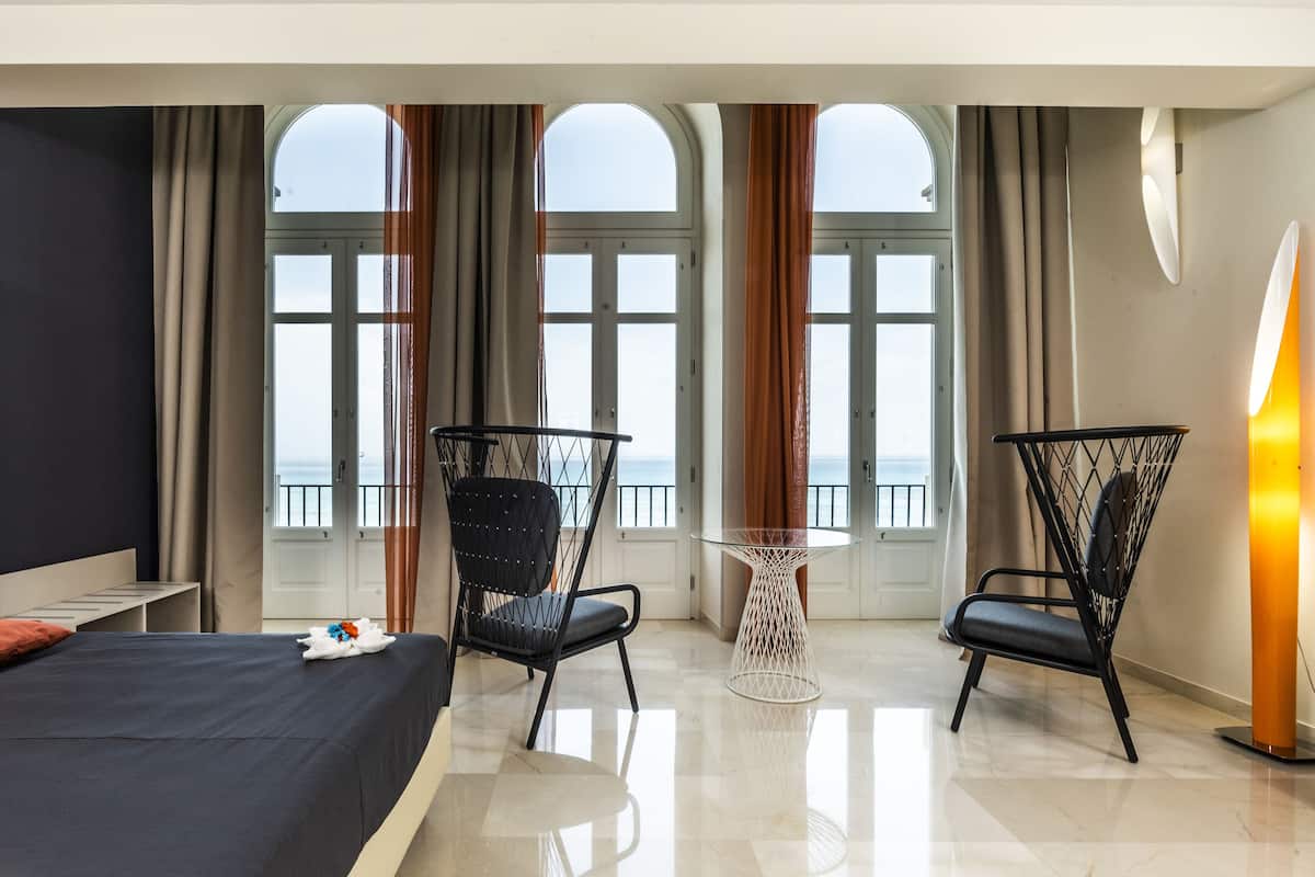 exclusive studio suite, sea view | premium bedding, desk, laptop workspace, soundproofing