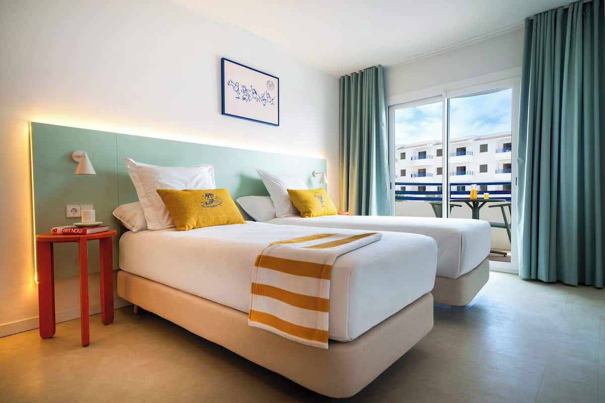 Superior Twin Room | Minibar, in-room safe, iron/ironing board (on request)