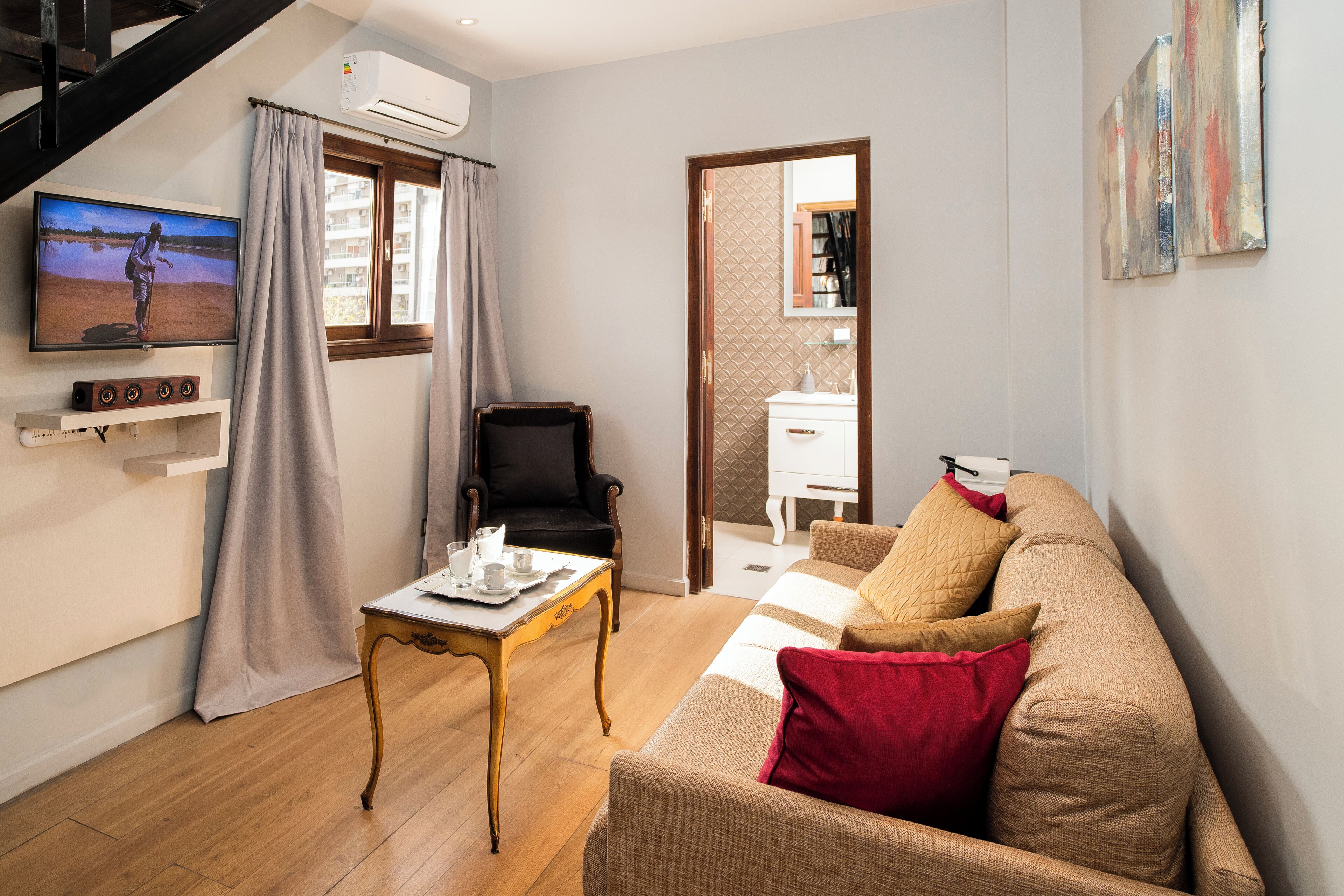 duplex | living area | 43-inch smart tv with cable channels, netflix, pay films