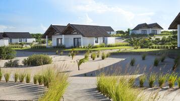 Habitación Deluxe, vistas al mar | Ropa de cama de alta calidad, minibar, caja fuerte y escritorio