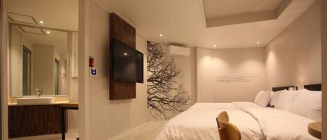 Habitación Deluxe con 2 camas individuales | Ropa de cama de alta calidad, caja fuerte, wifi gratis