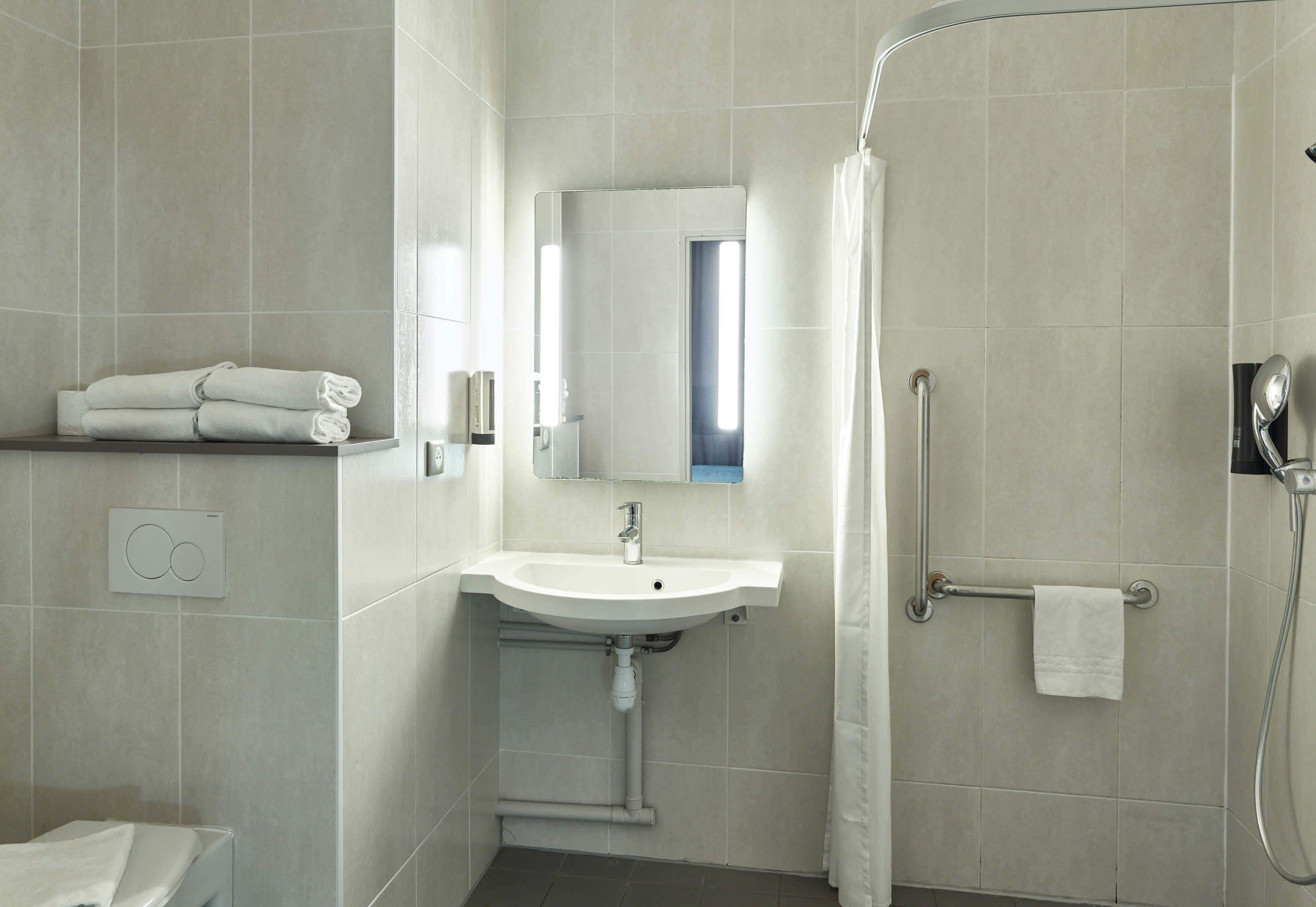 quadruple room, accessible | bathroom | shower, hair dryer, towels