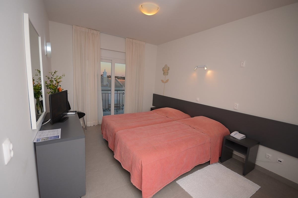 Minibar, schallisolierte Zimmer, kostenloses WLAN, Bettwäsche