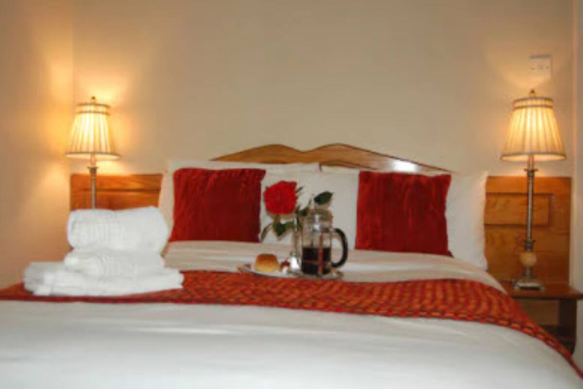 In-room safe, iron/ironing board (on request), bed sheets