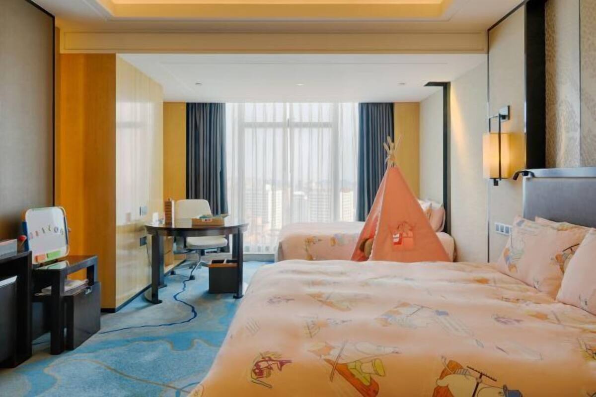 1 kamar tidur, seprai premium, minibar, dan brankas