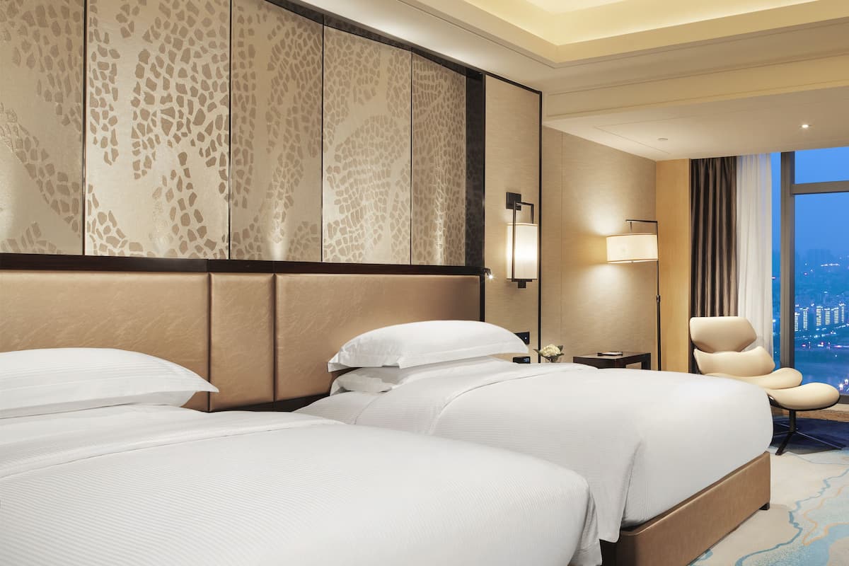 1 kamar tidur, seprai premium, minibar, dan brankas