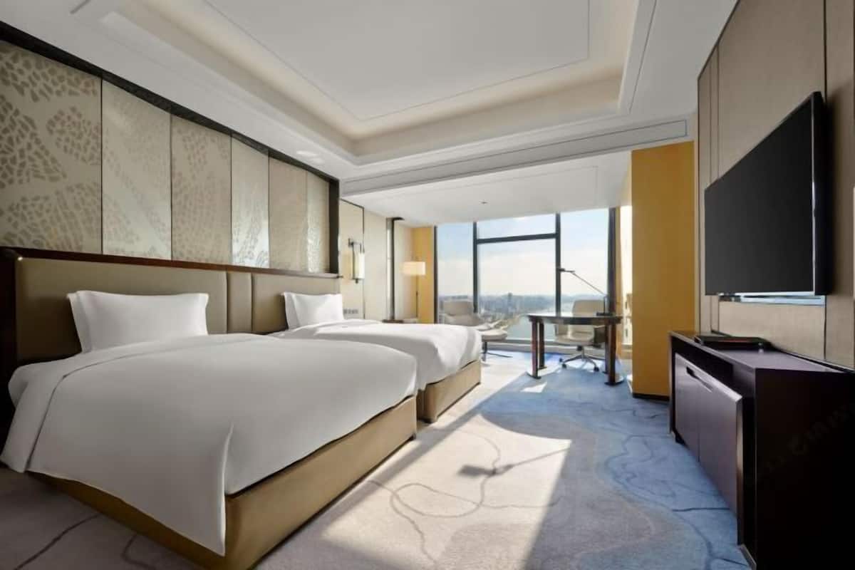 1 kamar tidur, seprai premium, minibar, dan brankas