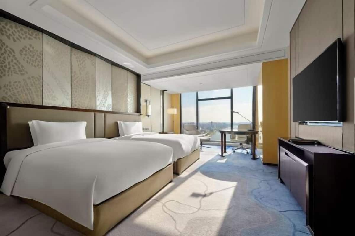 1 kamar tidur, seprai premium, minibar, dan brankas