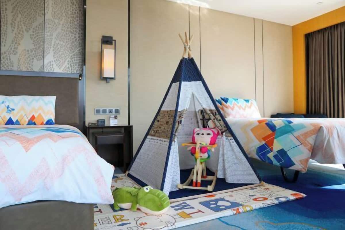 1 kamar tidur, seprai premium, minibar, dan brankas