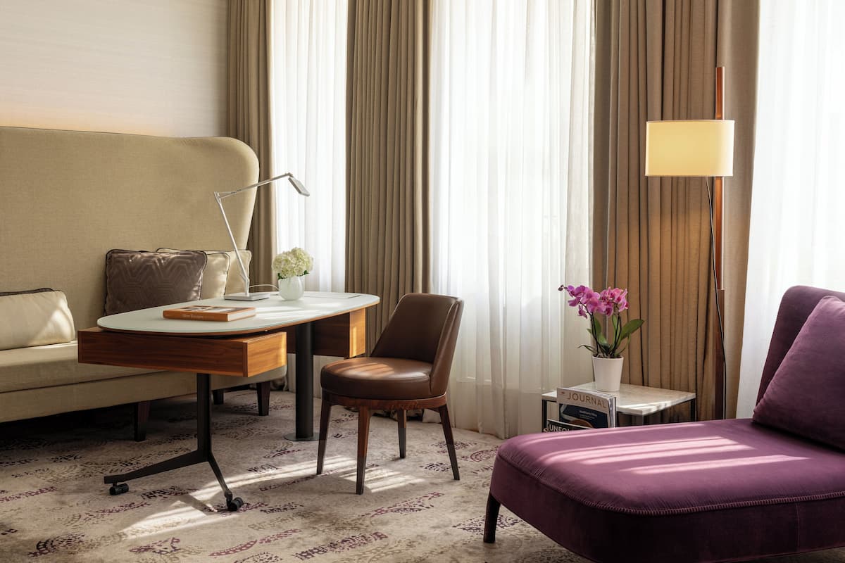 Suite, 1 King Bed (Milano) | Living area | 55-inch flat-screen TV with satellite channels, TV, iPod dock