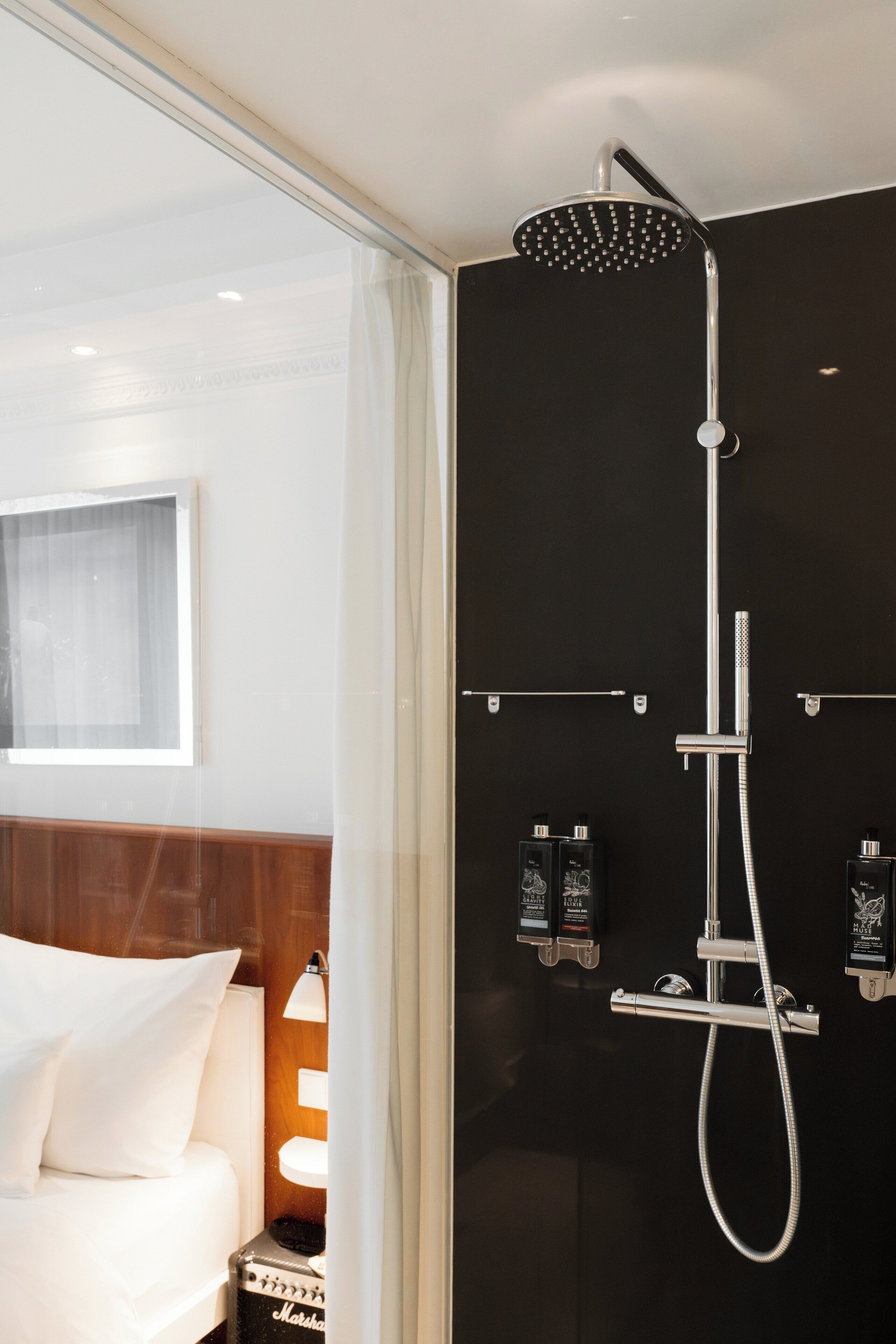 shower, rainfall showerhead, designer toiletries, hair dryer