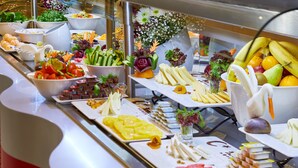 A buffet with various food items including fruits, vegetables, and cheeses. - Ibis Konya (Konya)