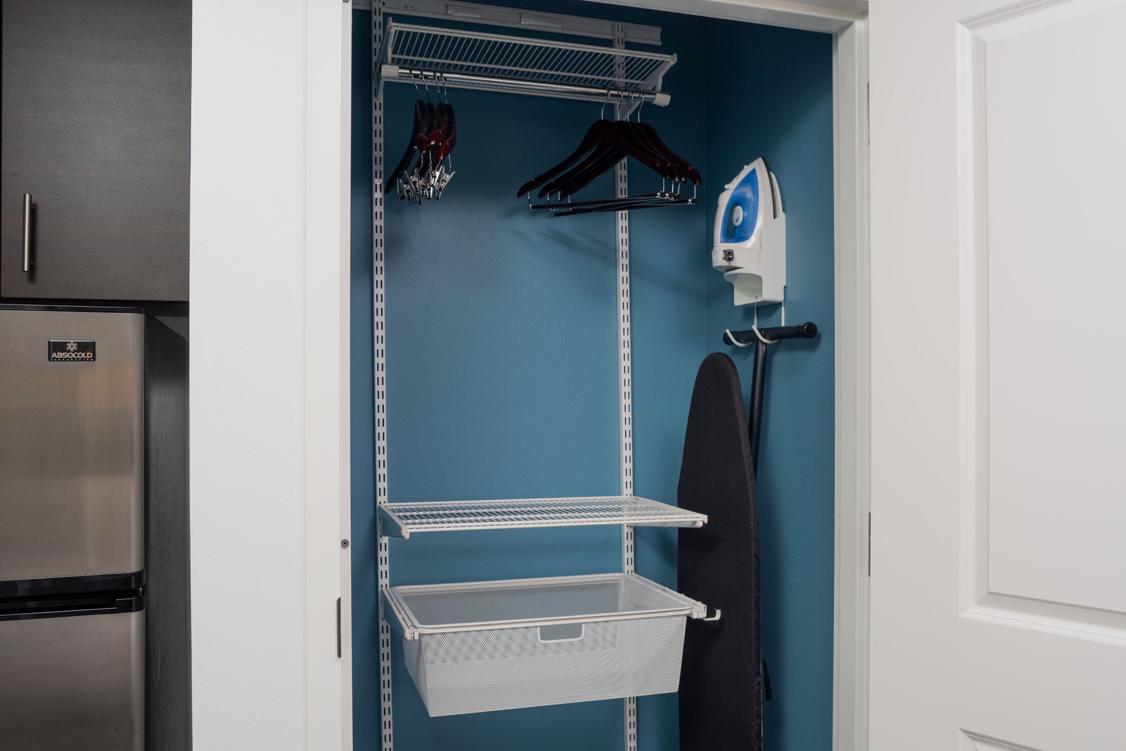 desk, blackout curtains, iron/ironing board, free cots/infant beds