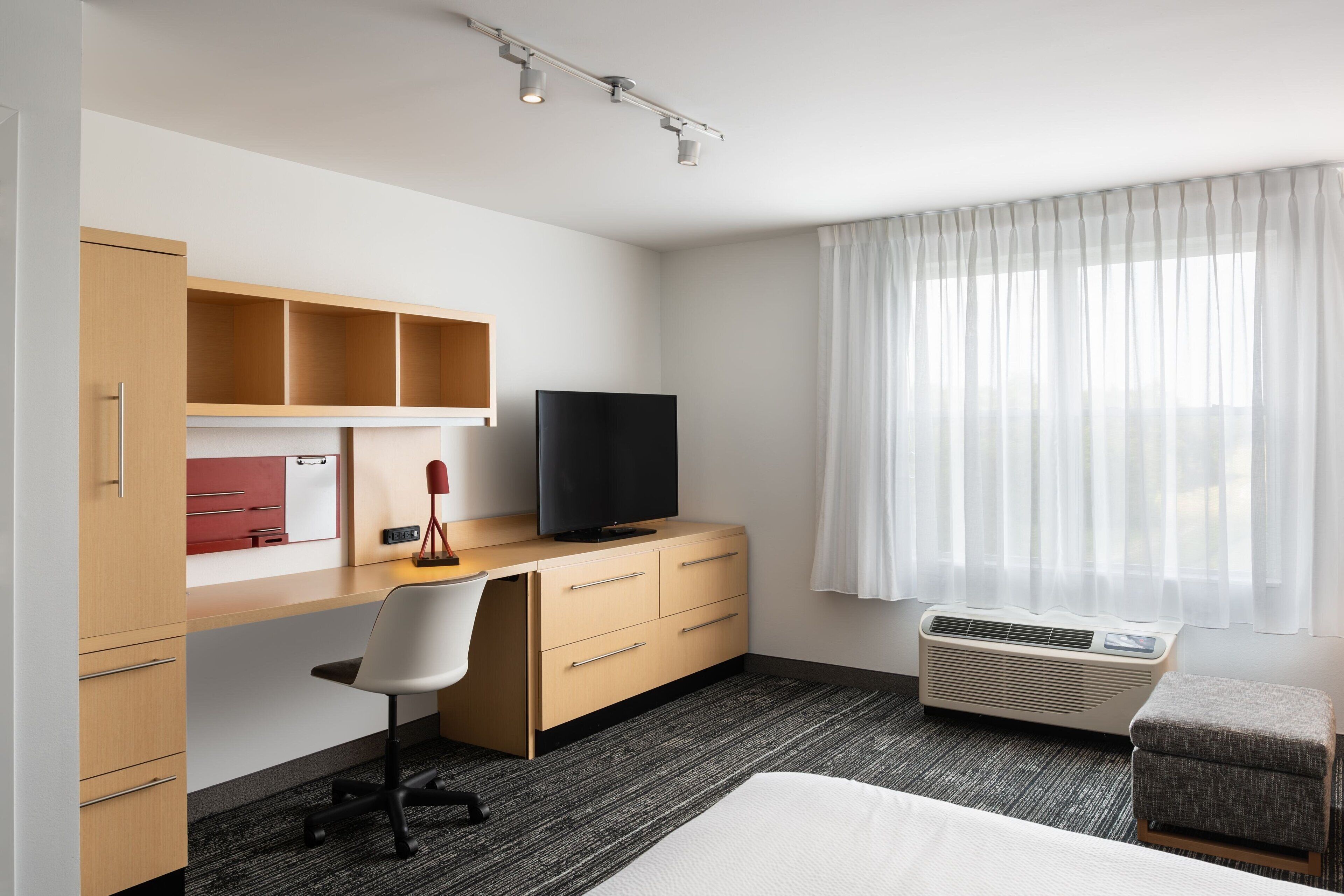 desk, blackout curtains, iron/ironing board, free cots/infant beds