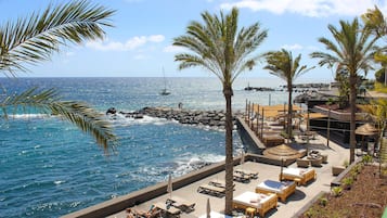 3 bars/lounges, swim-up bar, poolside bar, beach bar