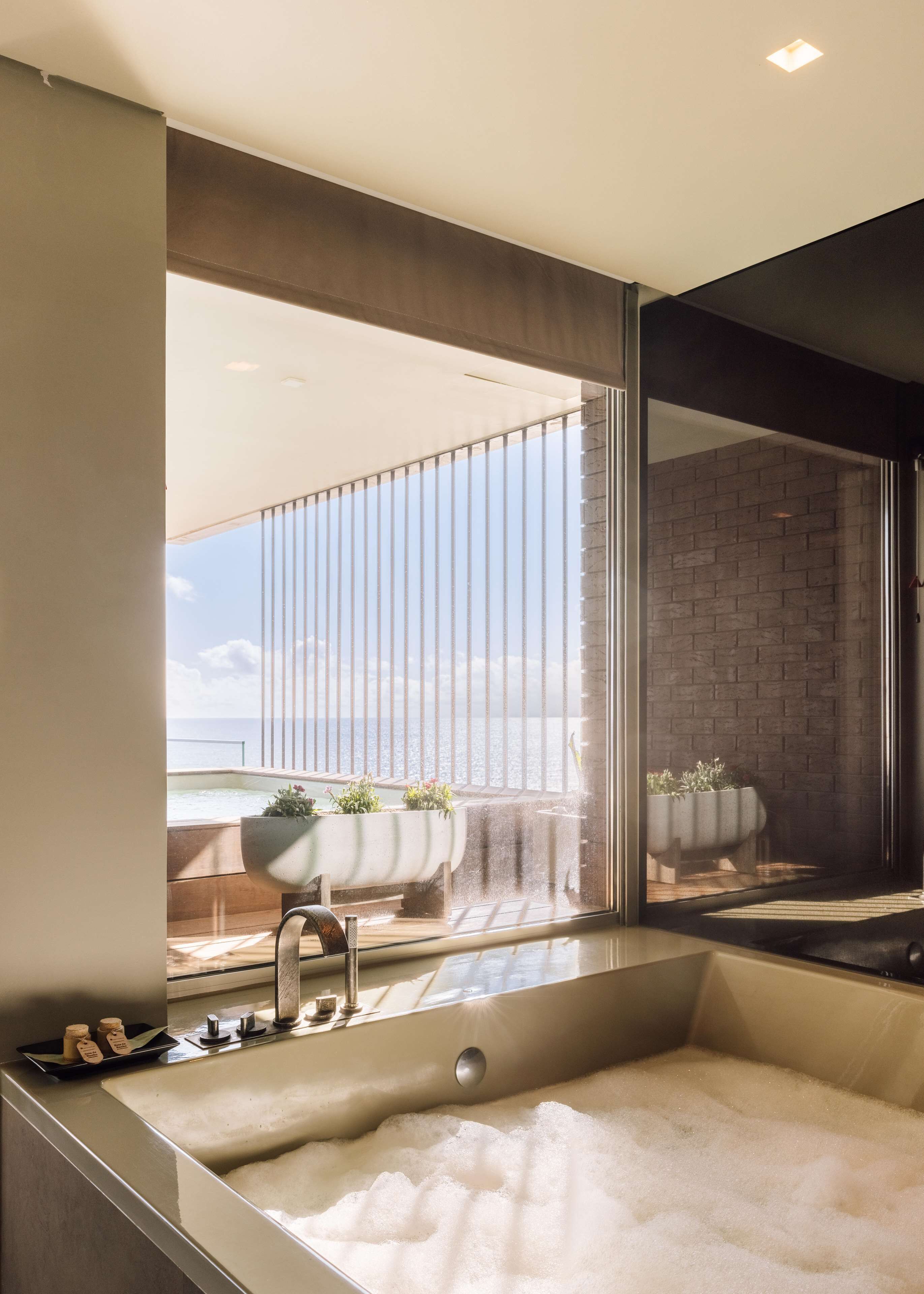 combined shower/bathtub, free toiletries, hair dryer, slippers