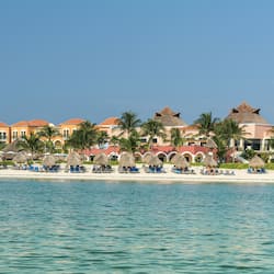 On the beach, sun-loungers, beach umbrellas, beach towels