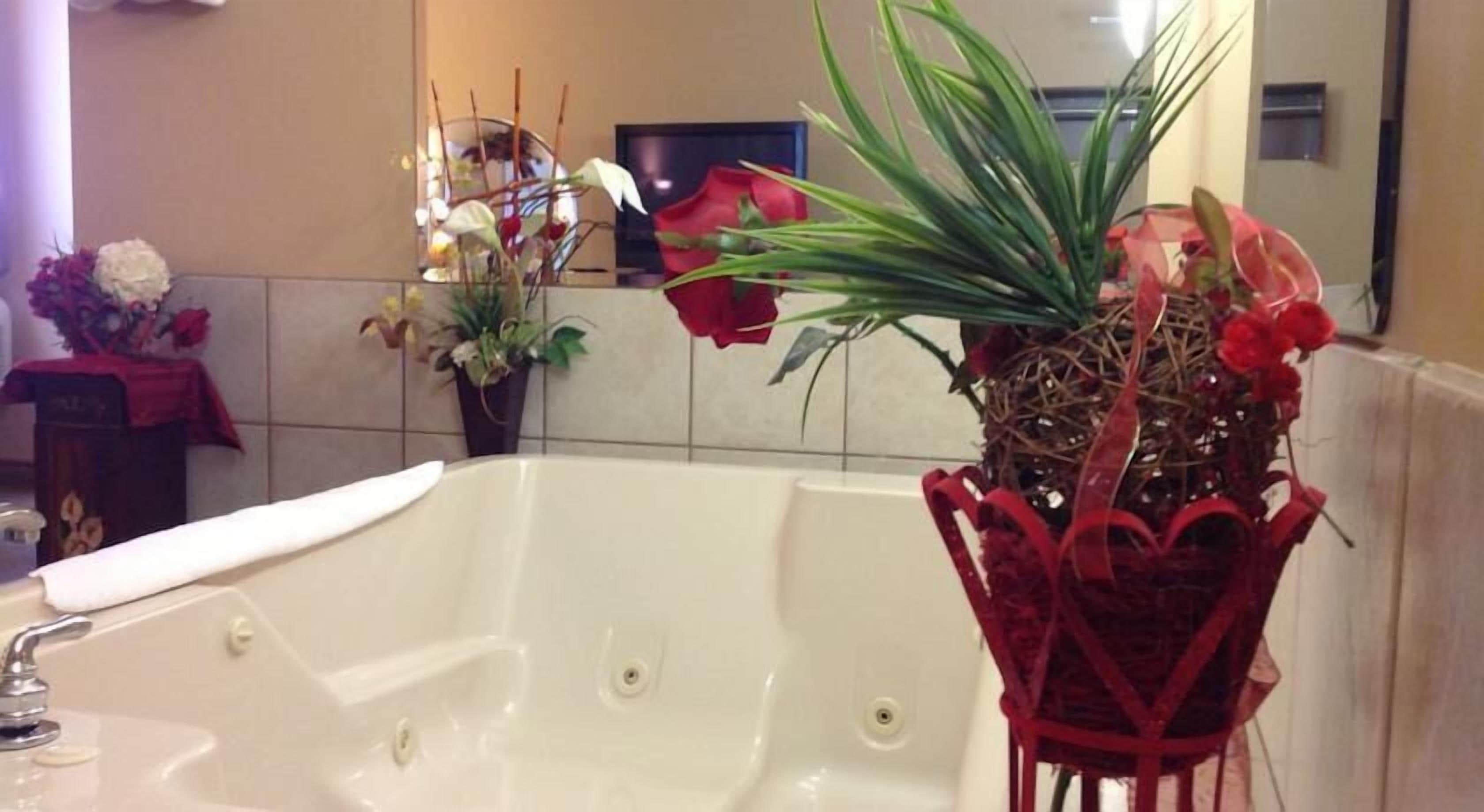 deluxe room, 1 king bed, hot tub | jetted bathtub