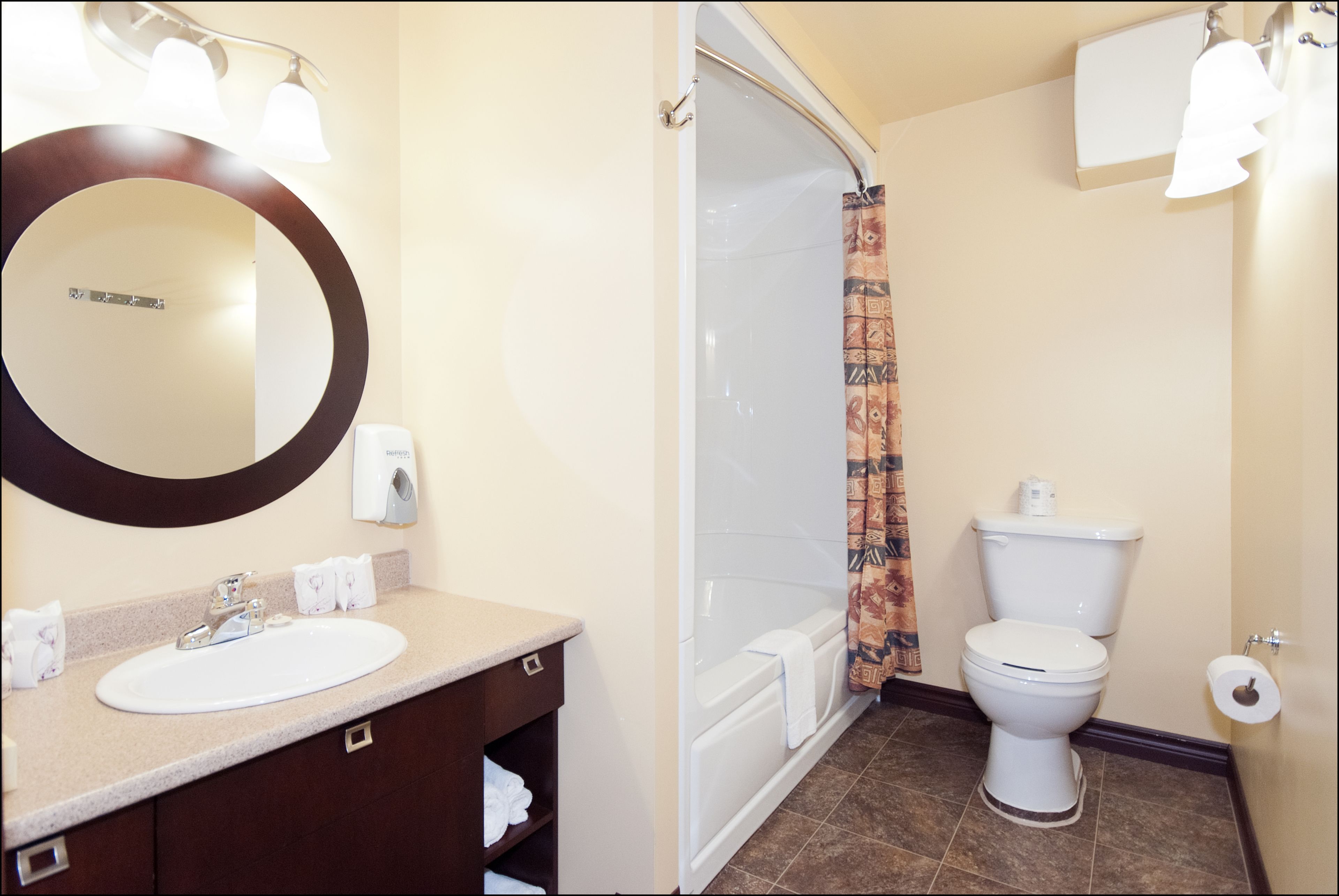 family room (basement), 2 queen beds and 1 double bed | bathroom | free toiletries, hair dryer, towels, soap