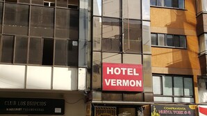 A hotel with a prominent red sign labeled "HOTEL VERMON". - Hotel Vermon (Armenia)