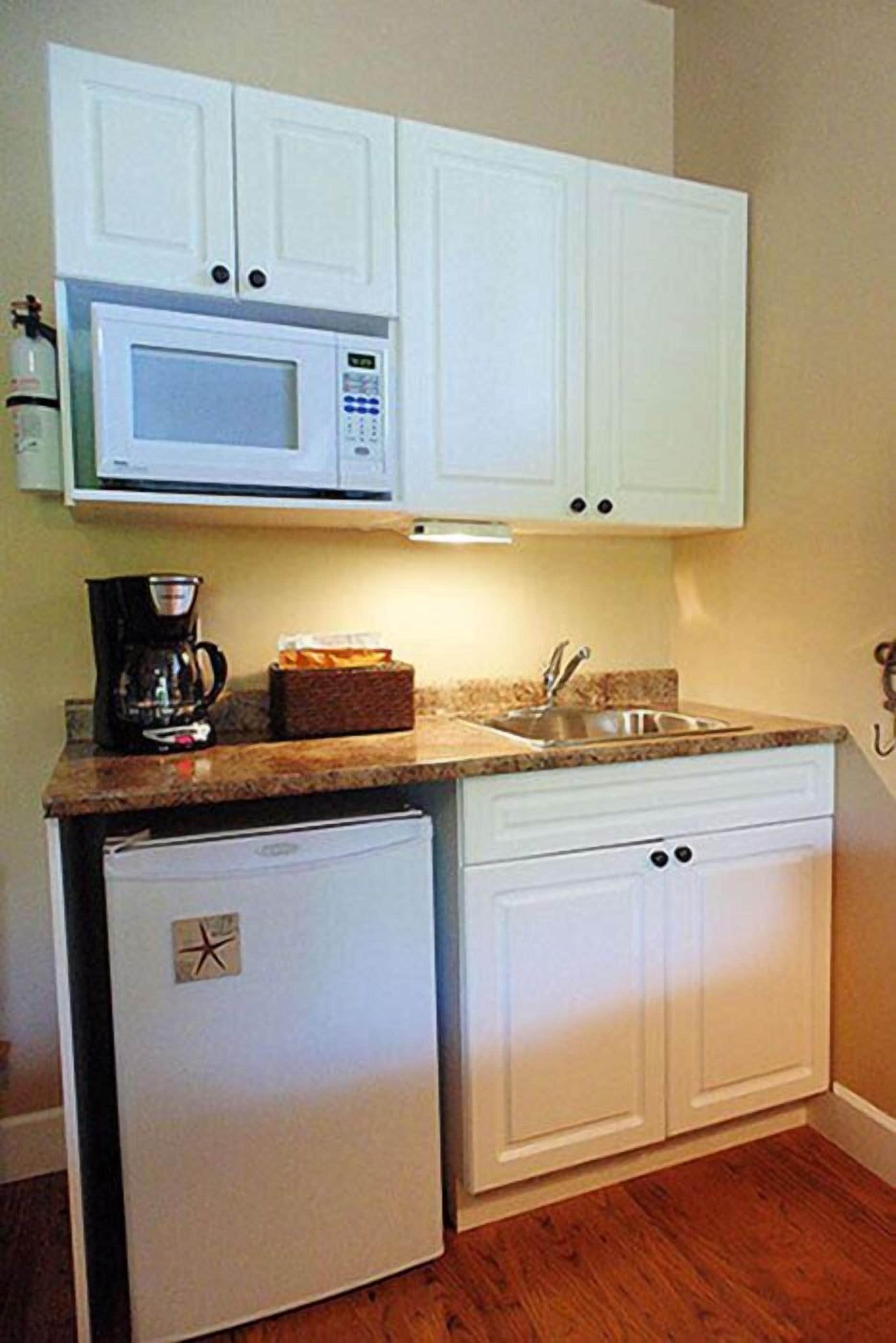 Signature Suite, 1 King Bed, Bay View | Private kitchenette | Coffee/tea maker, mini-fridge, microwave, electric kettle