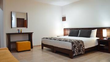 Habitación ejecutiva | Minibar, caja de seguridad en la habitación y wifi gratis