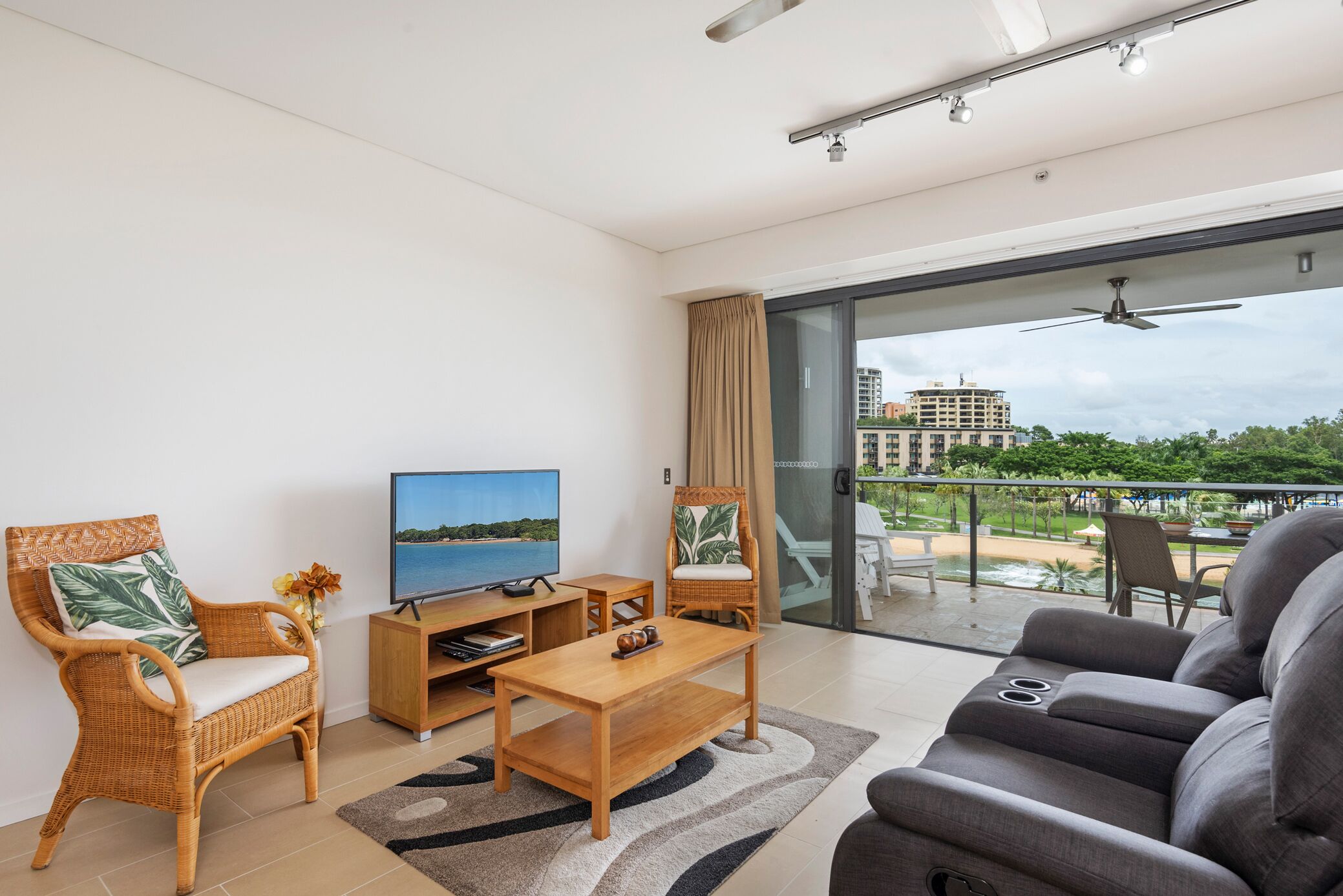 luxury apartment, 1 bedroom, beach view, beachfront | living area | flat-screen tv