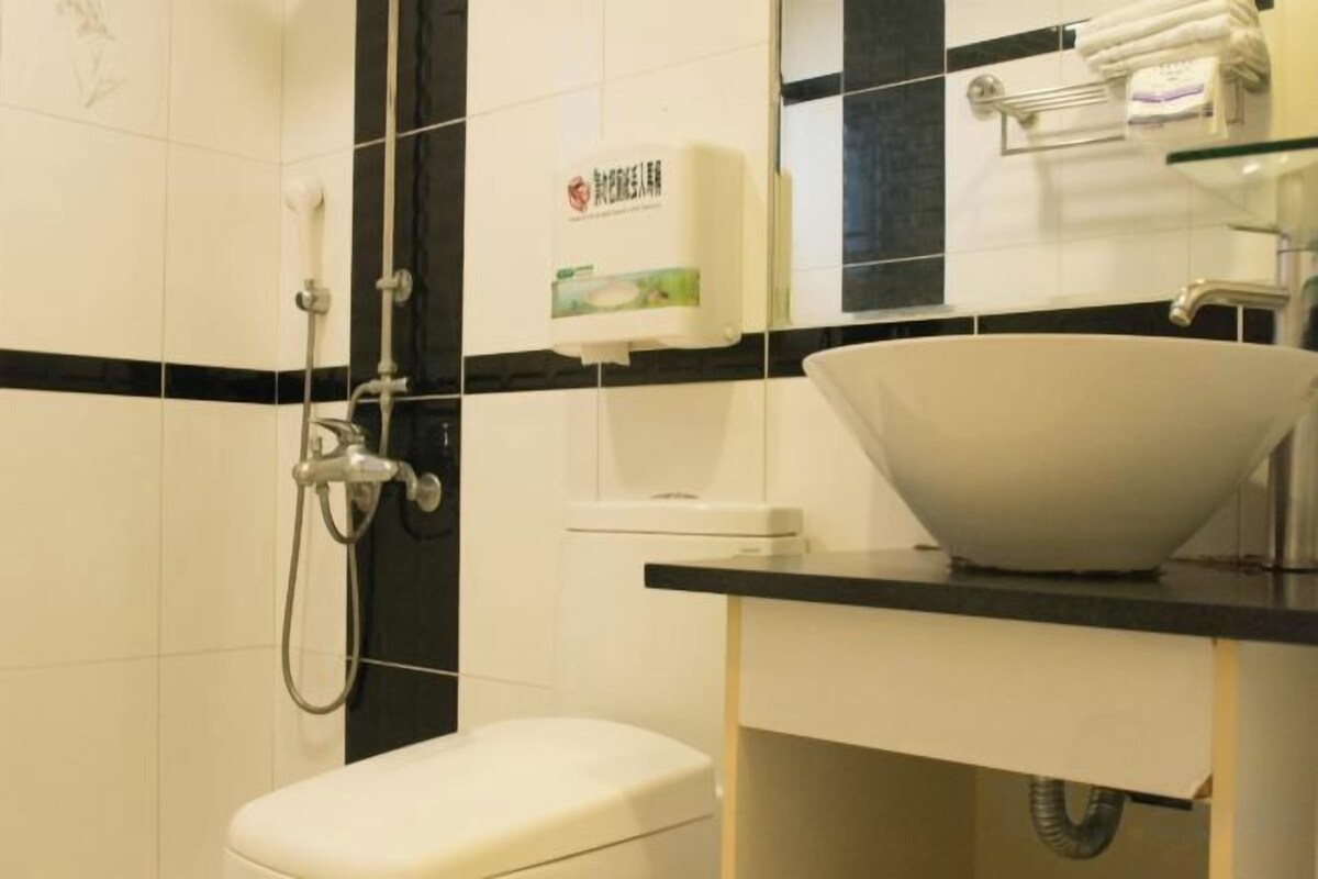 Bathroom | Shower, free toiletries, hair dryer, slippers