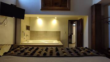 Family Room, 2 Bedrooms | Private spa tub