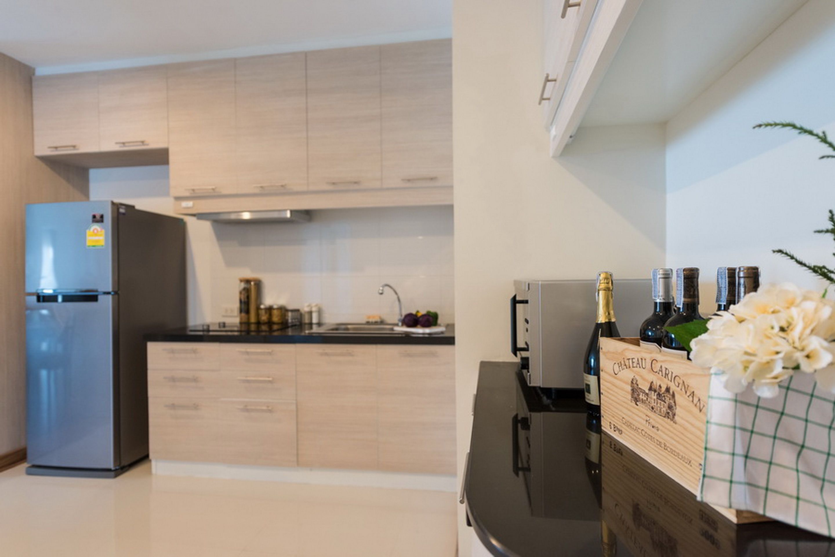 premier room, 2 bedrooms | private kitchen | full-sized fridge, microwave, stovetop, cookware/dishes/utensils