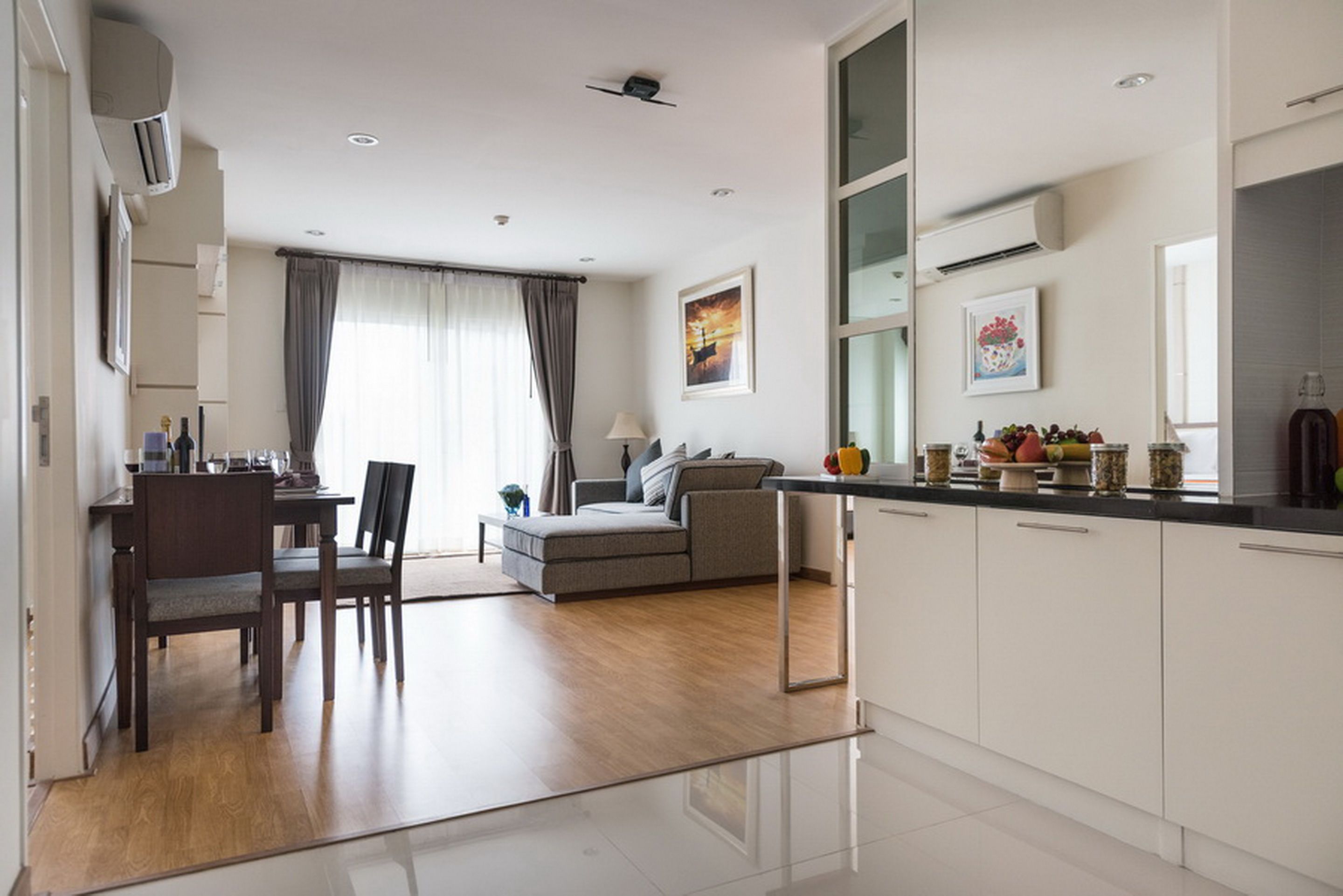 deluxe room, 2 bedrooms | living area | 36-inch led tv with cable channels, tv, dvd player