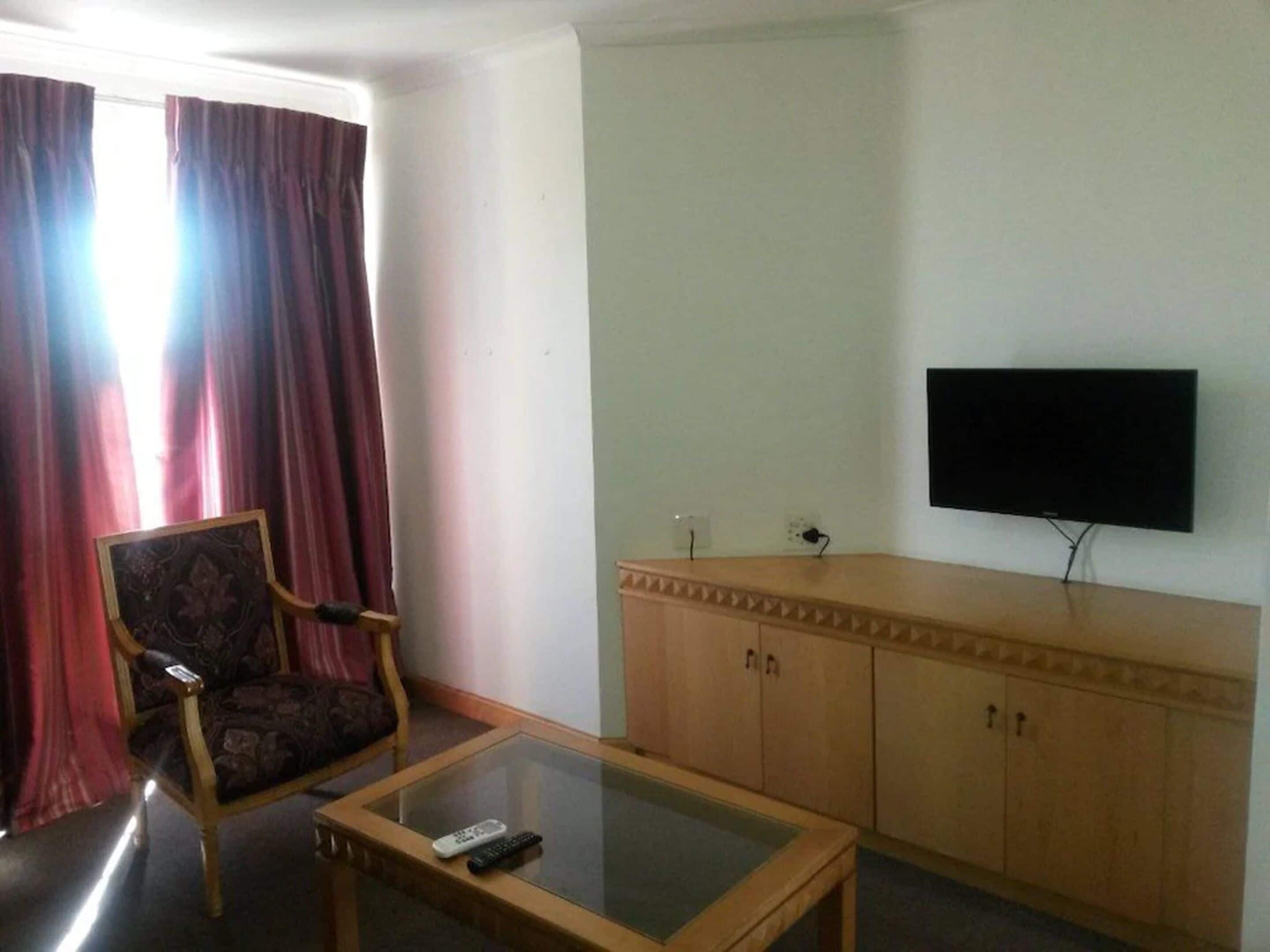 standard room, 1 bedroom, non smoking, city view | living room | tv