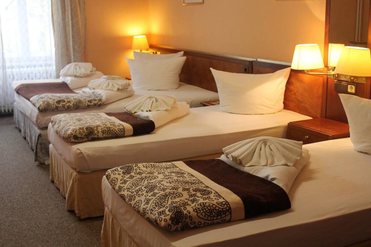 Quadruple Room | Desk, blackout curtains, free WiFi, bed sheets