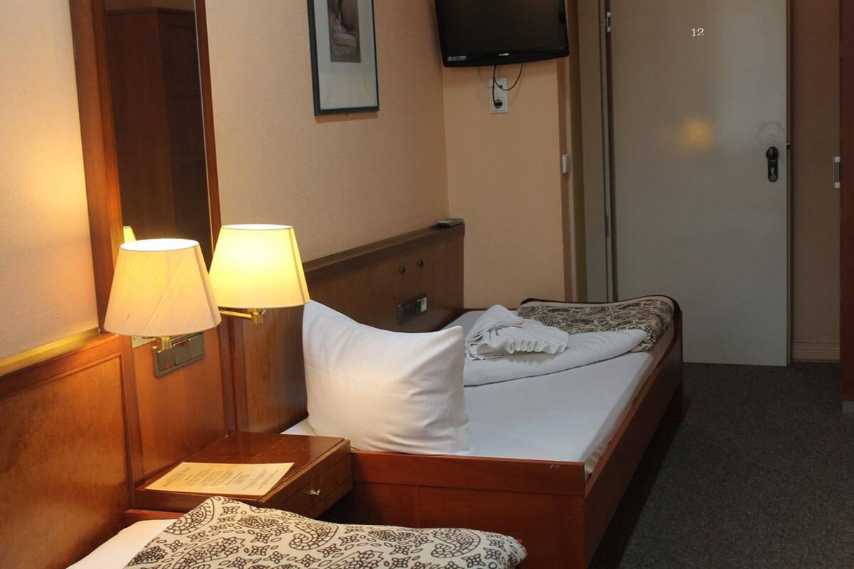 Basic Twin Room, 2 Single Beds | Desk, blackout curtains, free WiFi, bed sheets