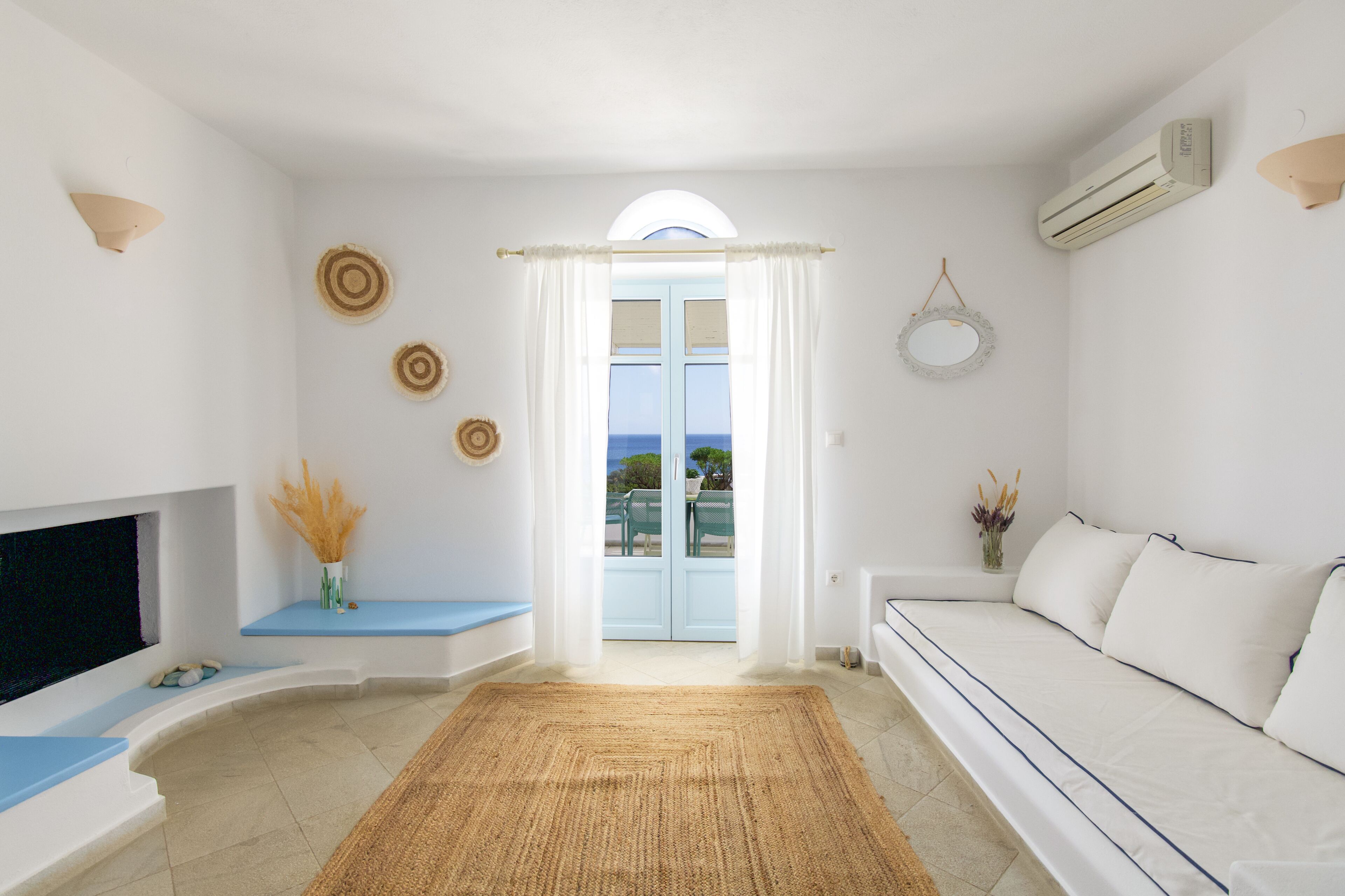 Deluxe Triple Sea View with outdoor hot tub | Living area | 32-inch LCD TV with satellite channels