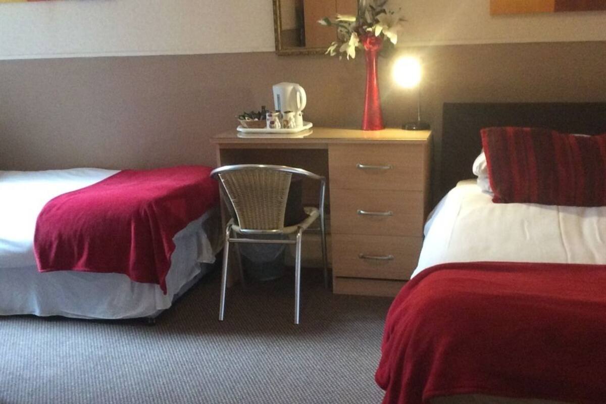 Twin Room | In-room safe, desk, blackout curtains, iron/ironing board