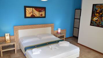 Kamer, 1 twee- of 2 eenpersoonsbedden, patio (Turchese) | 1 slaapkamer, een minibar, een bureau, geluiddichte muren