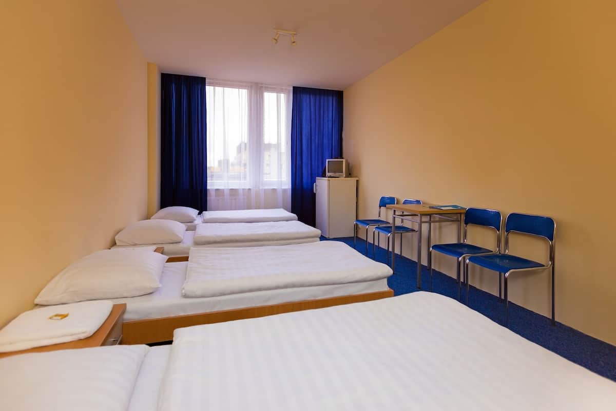 Economy Quadruple Room, Shared Bathroom | In-room safe, WiFi (free), bed sheets