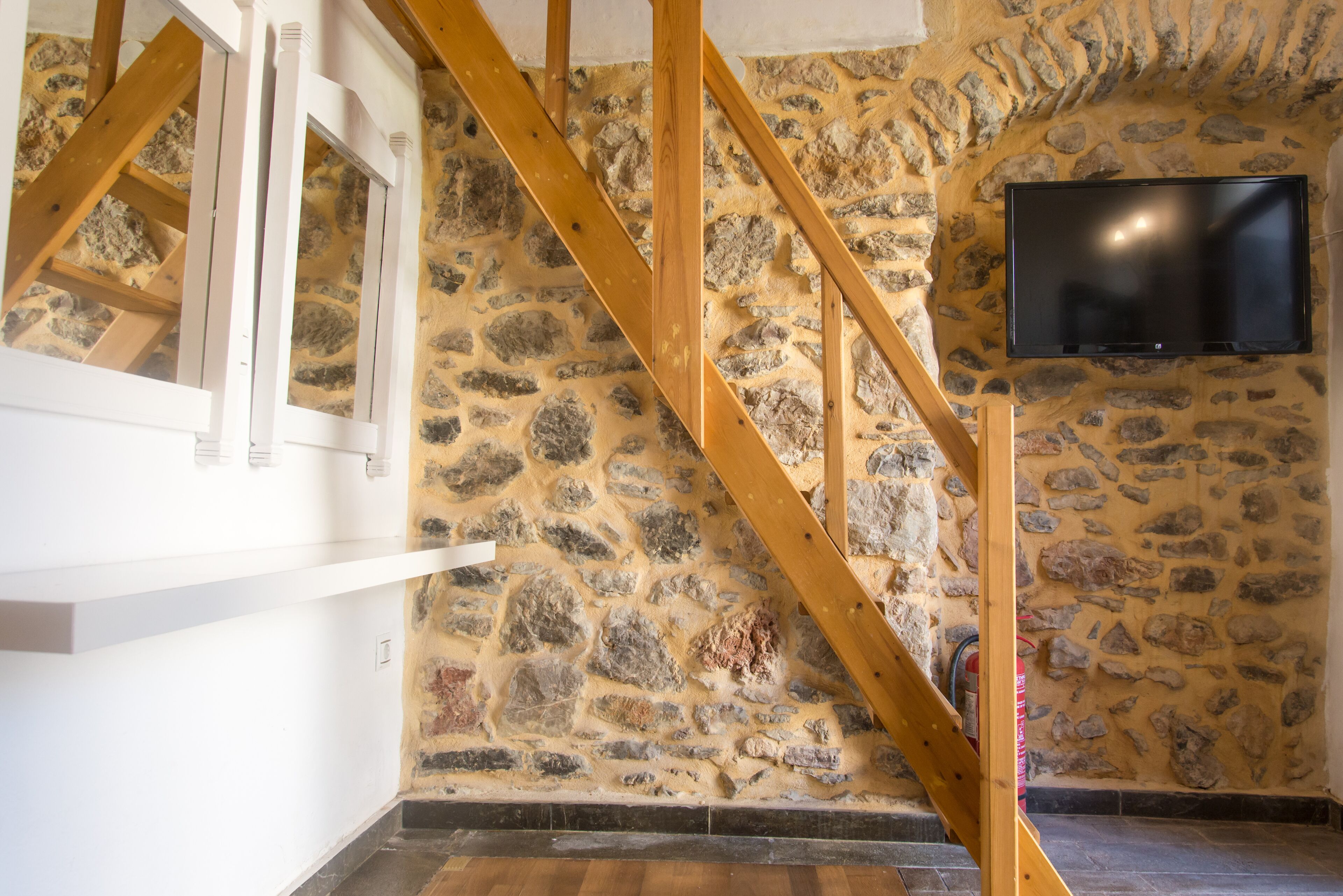 twin room (aspros gatos patari) | in-room safe, individually decorated, individually furnished, desk