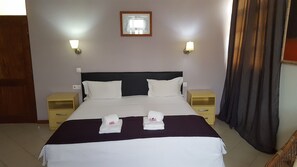 Superior Studio Suite, Partial Ocean View | Minibar, individually decorated, blackout drapes, free WiFi