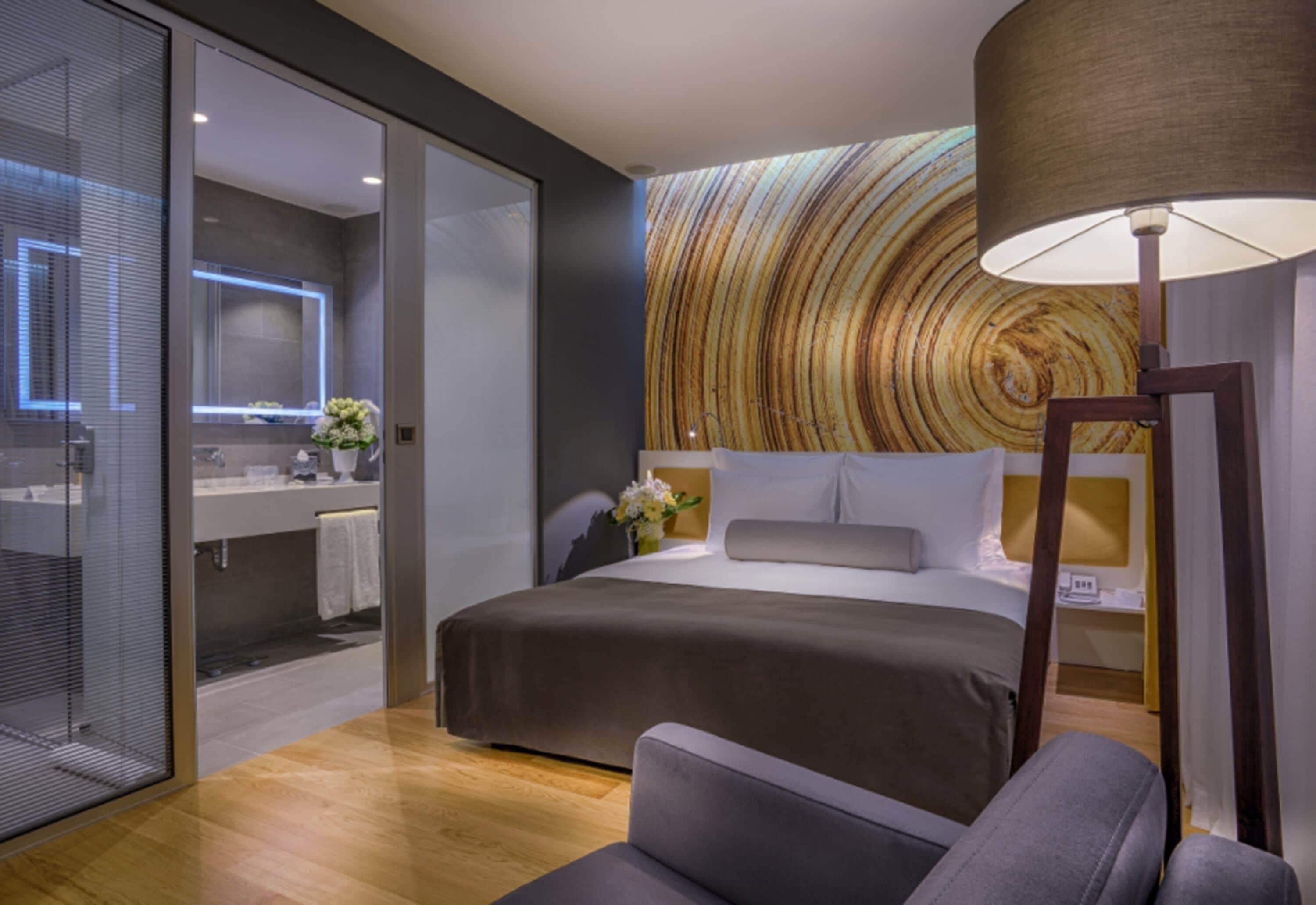 deluxe room | premium bedding, down duvets, desk, laptop workspace