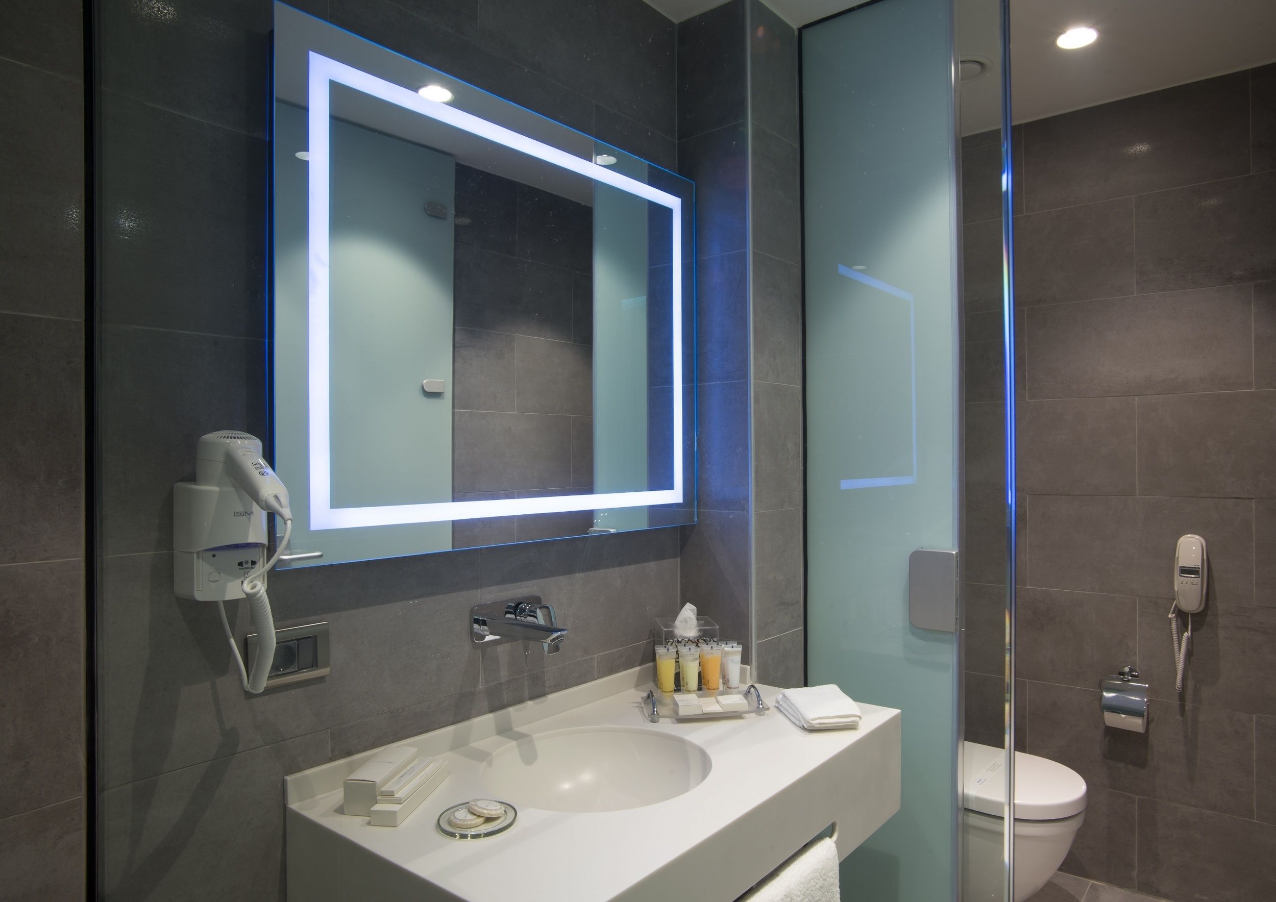 shower, eco-friendly toiletries, hair dryer, slippers